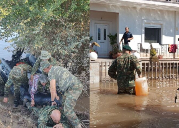 Εύγε, παλικάρια: Πεζοναύτης ξαπλώνει στις λάσπες για να περάσουν πάνω του ηλικιωμένοι πλημμυροπαθείς